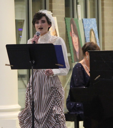 Student concerts in 2020. Young woman singing ragtime song in live concert.